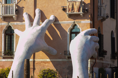 Venice, Lorenzo Quinns hands support the city against climate changeの写真素材