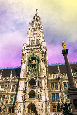 Romantic view of Rathaus Glockenspiel at sunset in the famous Marienplatz of Munich, Bavaria, Germanyの写真素材
