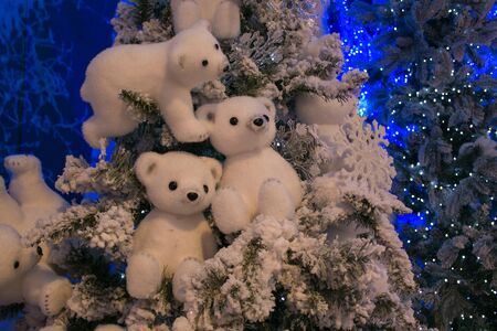 Details of beautiful christmas tree with polar bears and lightsの写真素材