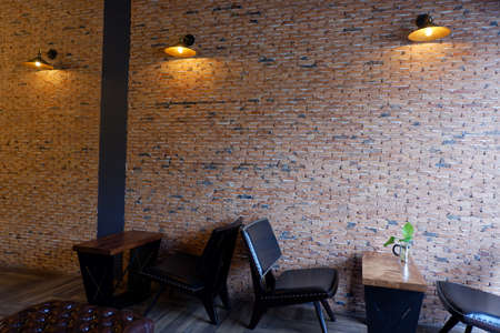 Lovely corner and Beautiful brick wall in coffee shop.の写真素材