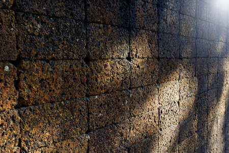 Red Laterite brick stone  with shadow.