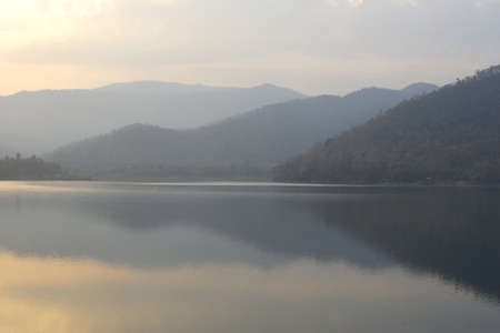 Sunrise over mountain on the lake.の写真素材