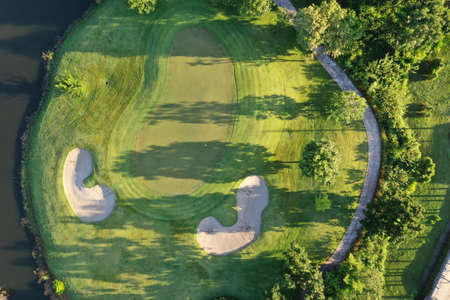 Aerial view Green Golf course in the morning.の写真素材