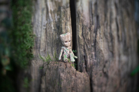 CHIANGMAI, THAILAND-SEPTEMBER 2022 : Baby Groot is sitting in green garden at public park. Chiang Mai, Thailand.の写真素材
