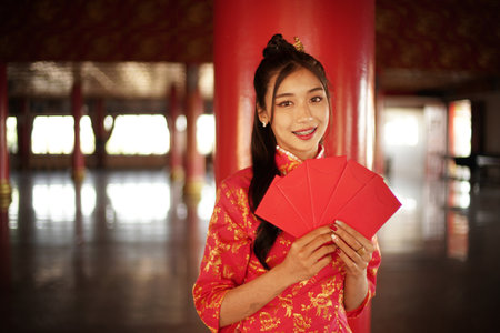 Asian Chinese Girl with her Angpao.の写真素材