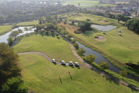Aerial view Green Golf course in the morning.の写真素材