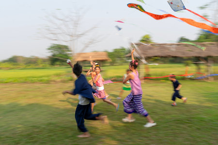 THAILAND - CHIANG-MAI, 31 MARCH 2024 : Group image of cute Asian children playing in the park.のeditorial素材