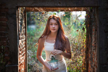 Relax concepts, Beautiful teenage girl on a bright day in nature gardenの写真素材