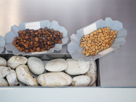 Coffee beans in a grey cup for background