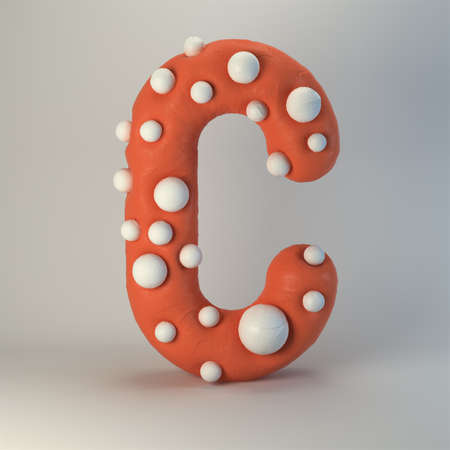 3d rendering of plasticine handmade font. Cute cartoon children's style figures with white polka dots. Bright red uppercase letter C, isolated on white background.の写真素材