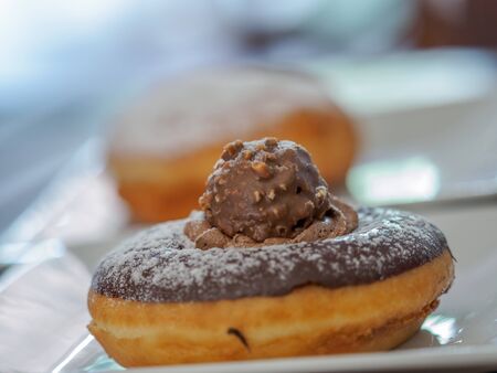 isolated chocolate donuts