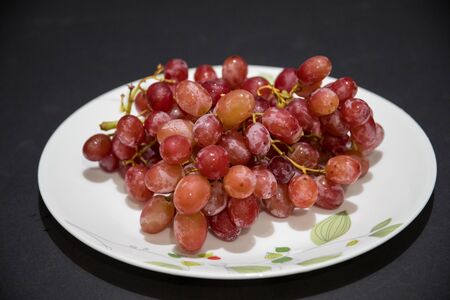 grapes on the plateの写真素材