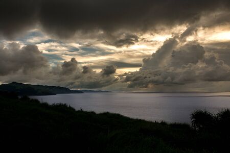sunset in Naidi Hills , Ivatan Island, Batanes, Philippinesの写真素材