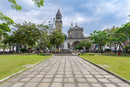 Feb 21, 2018 Tourists and cataclysmic tourists visiting the Manila Cathedral Gardens, Manila , Philippinesのeditorial素材