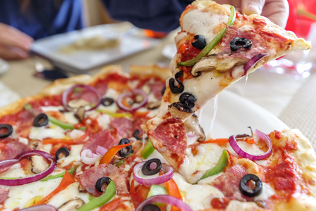 Italian style thin pizza on the table, Manilaの写真素材