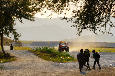 Feb 17,2018 Aeta people returning home at sunset, Capas, Philippinesのeditorial素材