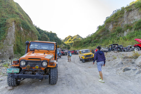 Feb 18, 2018 Four-wheel drive cars parked at the start of the Pinatubo hike, Capas , Philippinesのeditorial素材