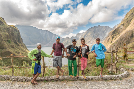 Feb 18,2018 Aboriginal guides resting on Mt. Pinatubo crater lake, Capas , Philippinesのeditorial素材
