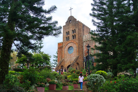 Batangas, Philippines - Jun 2, 2018 : People who take pictures in front of the Caleruega chapelのeditorial素材