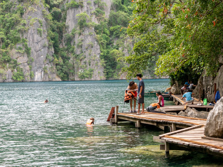 Nov 16,2018 People who enjoy water play in the Kayangan lake at Coron Island, Palawan, Philippinesのeditorial素材