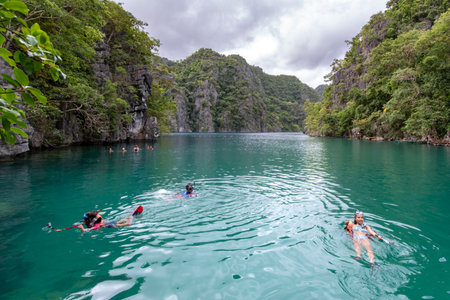 Nov 16,2018 People who enjoy water play in the Kayangan lake at Coron Island, Palawan, Philippines