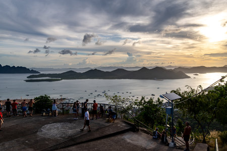 People watching the sunset in the mountain Tapyas at Coron , Palawan, Philippinesのeditorial素材