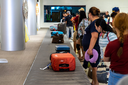 Dec 25, 2018 People waiting for luggage at Clark Airport Terminal, Angeles, Philippinesのeditorial素材