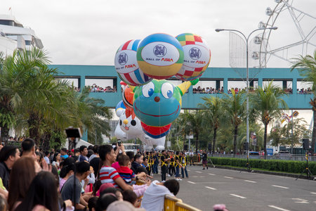 Jan 1, 2019 People watching the New Year parade at the Mall of Asia, Manila, Philippinesのeditorial素材