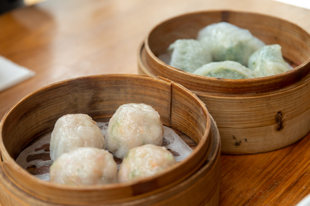 Popular asia food fork dimsum in the bowlの写真素材