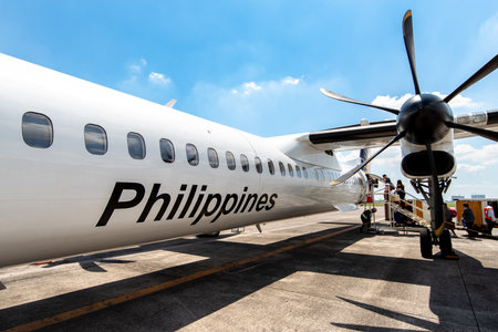 Apr 26, 2019 Passengers boarding an airplane at Clark Airport, Clark, Philippinesのeditorial素材