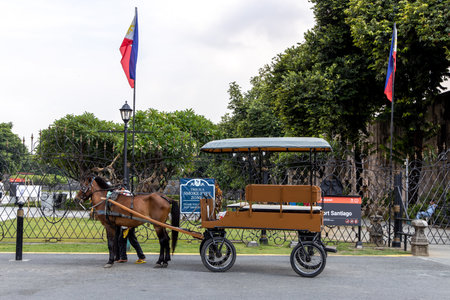 June 9, 2019 A kalesa waiting for guests at Intramuros, Manila, Philippinesのeditorial素材
