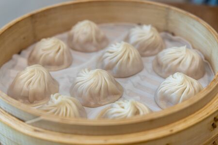 Popular chinese steamed bun Xiaolongbao in the Basketの写真素材