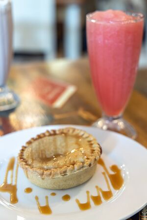 Apple pie with Watermelon shake on the tableの写真素材