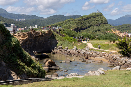 Aug 22,2019 Tourists looking around the Yehliu Geopark, New Taipei City, Taiwanのeditorial素材
