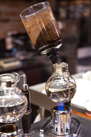 Barista doing Siphon Coffee Brewing, Manilaの写真素材