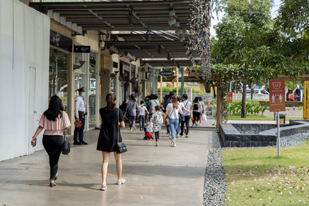 Dec 8, 2020 People enjoying shopping on Bonifacio high street, Makati city, Metro Manila ,...