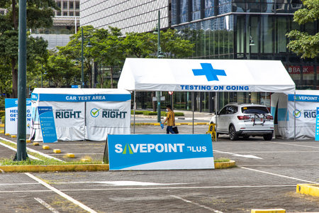 Dec 8, 2020 Drive thru covid test center at Bonifacio high street, Makati city, Metro Manila , Philippinesのeditorial素材
