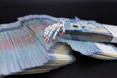 A pile of one thousand Philippines banknotes. Cash of Thousand peso bills, Peso background image.の写真素材