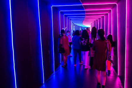 People taking pictures in shopping mall event space, Manila , Philippines, July 4, 2021のeditorial素材