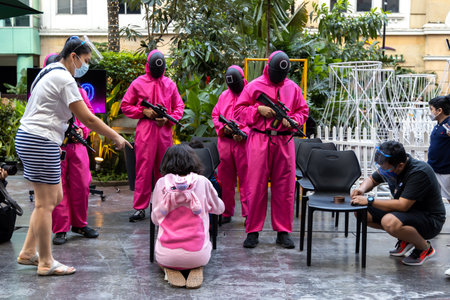 People who enjoy Squid game event at the Eastwood Shopping Mall, Metro Manila, Philippines, Oct 31, 2021のeditorial素材
