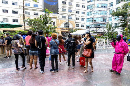 People who enjoy Squid game event at the Eastwood Shopping Mall, Metro Manila, Philippines, Oct 31,...