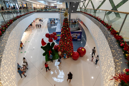 People who taking photo at front of christmas decoration in Mall of Asia, Metro Manila, Philippines, Nov 28, 2021のeditorial素材