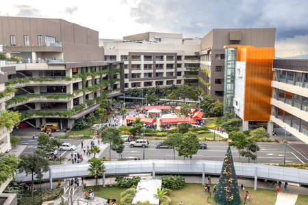 People who enjoy shopping at Ayala Manila Bay Mall, Metro Manila, Philippines, Dec 25, 2021のeditorial素材