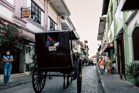 Tourist walking around vigan Unesco heritage site, Vigan City, Philippines, Dec 29, 2021
