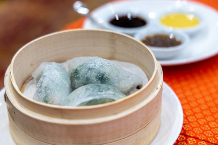 Delicious Chinese spinach dim sum on the tableの写真素材