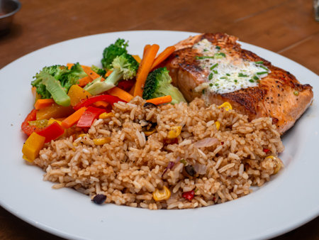 Salmon steak with fried rice in the restaurant at Metro Manila, Philippinesの写真素材