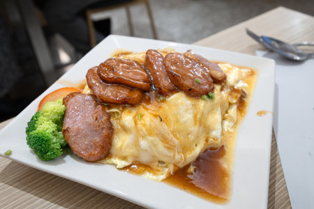 Popuplar Hongkong dishes Scrambled Egg with Smoked Duck Fired Rice in the restaurantの写真素材