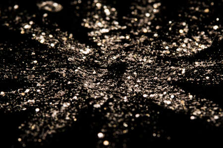 A flower drawn with nail polish at black backgroundの写真素材