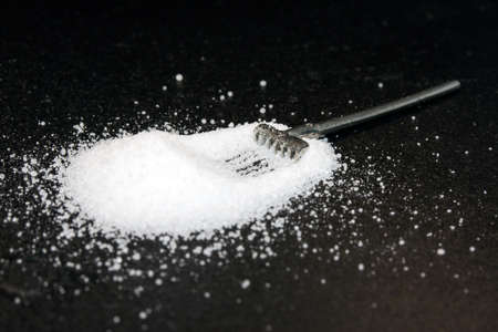 Rake pulling in saltの写真素材