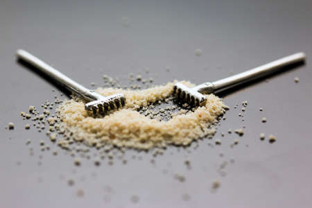 Semolina and pair of rakesの写真素材